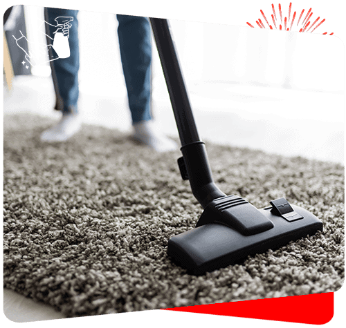 Vacuum cleaner on plush carpet for professional cleaning services at Sweepy Maids.